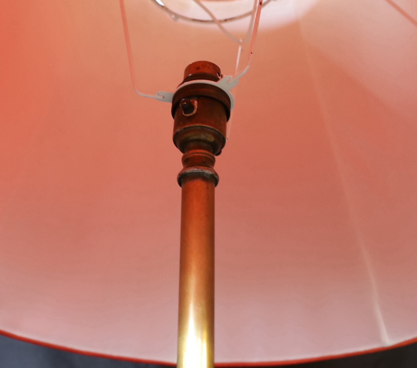 A late 19th century English brass and copper telescopic lamp standard, converted to electricity, height 148cm. width of base 50cm.